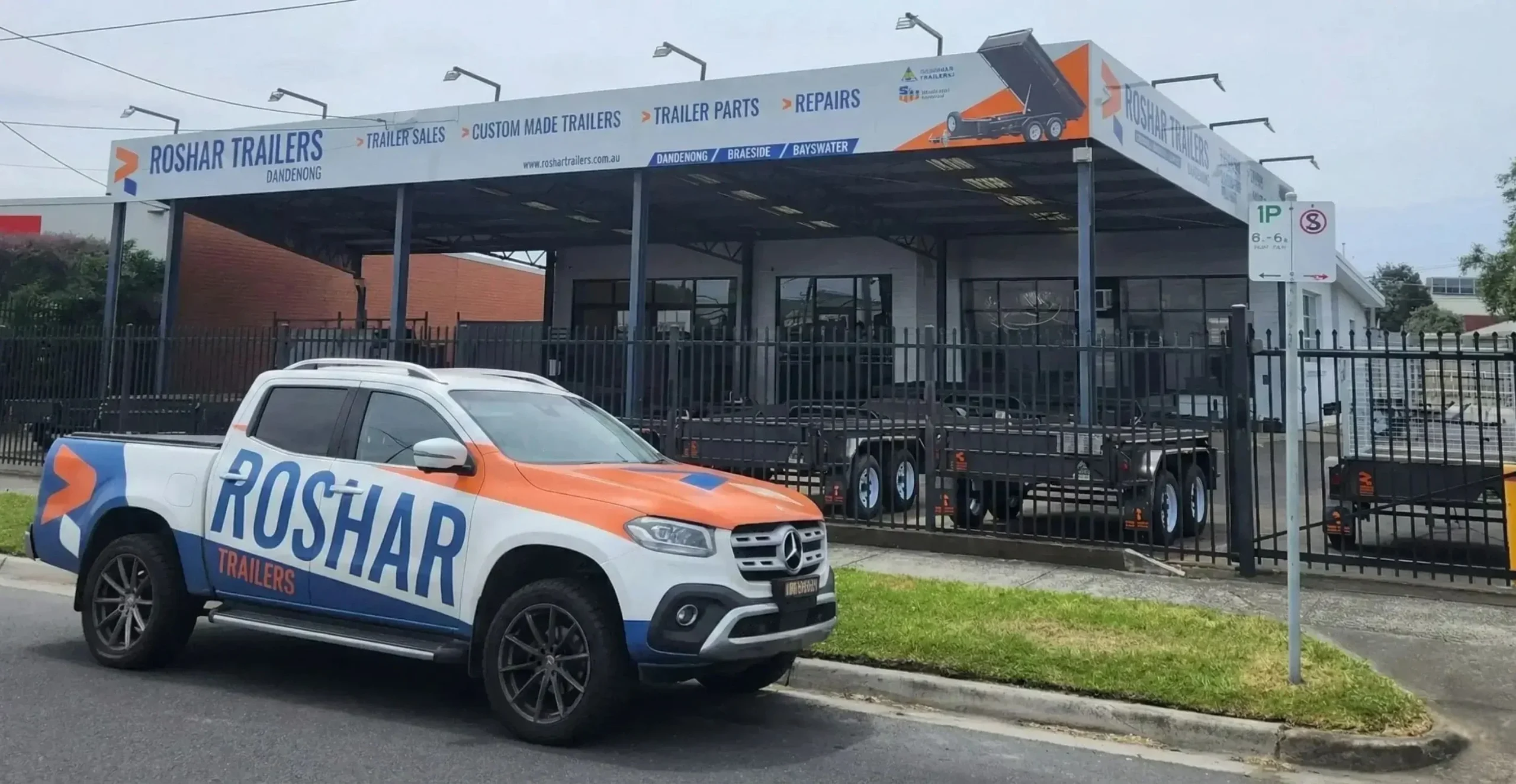 Outdoor fascia business signage for trailer sales showroom