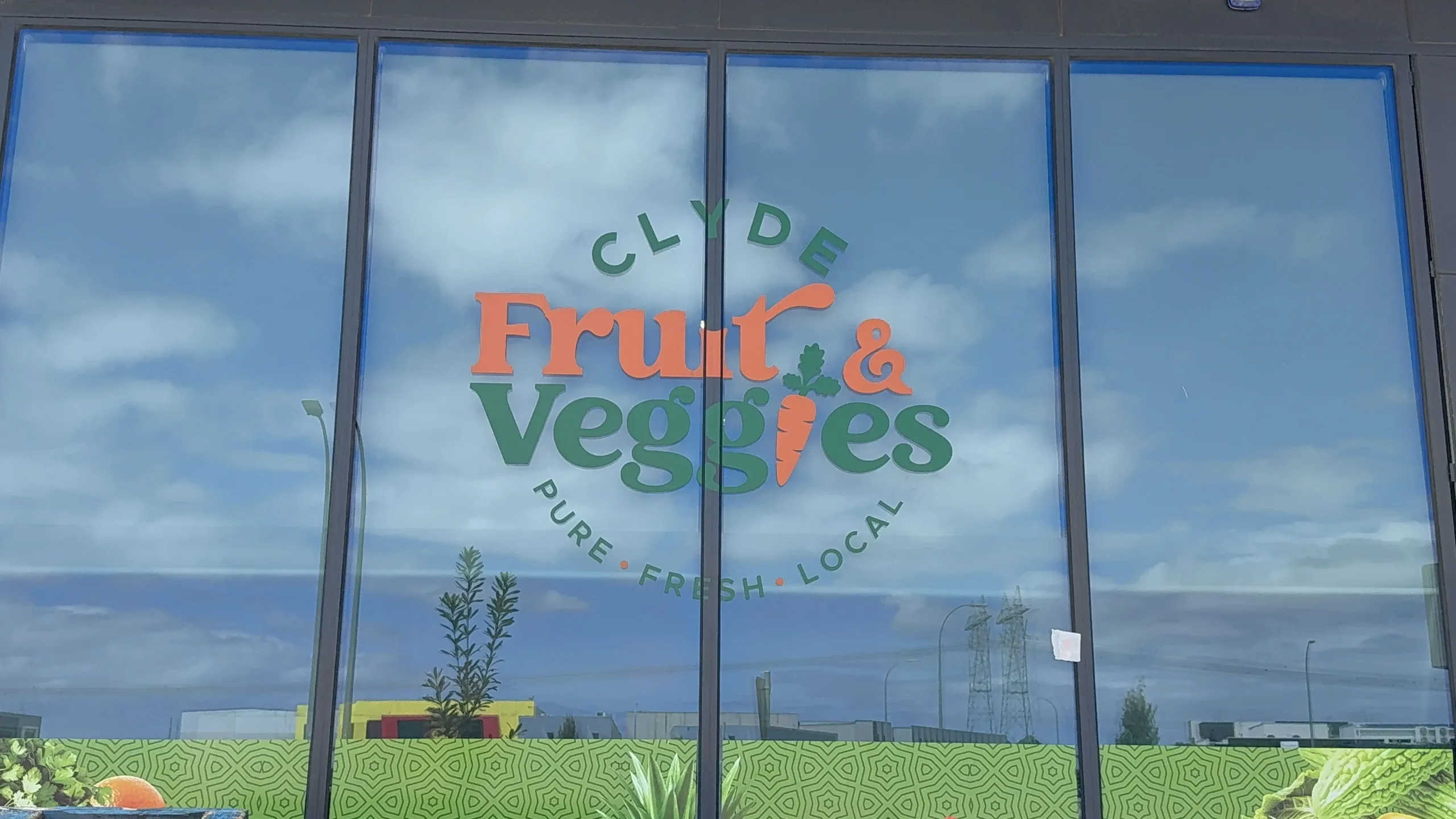 Window vinyl business signage for Clyde Fruit & Veggies storefront